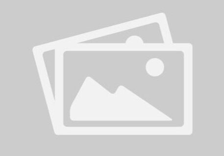 Placeholder image of mountains and sun.